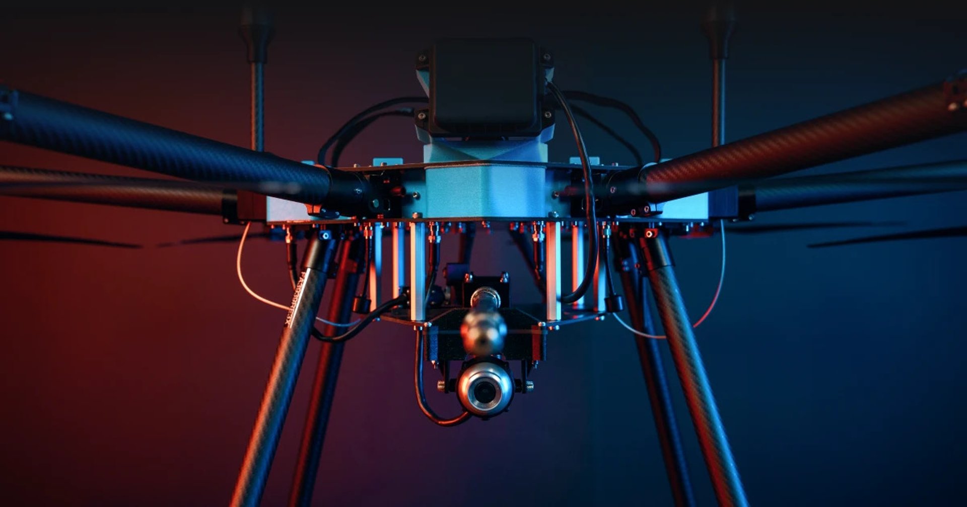 Industrial cleaning drone washing tall plant equipment from ground level
